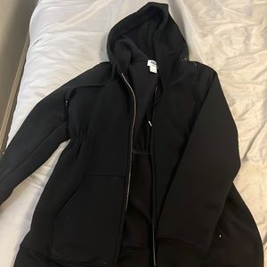 Maternity sweater, winches around top of tummy to show off bump!